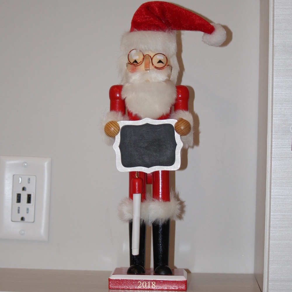 Santa holding chalkboard figure
